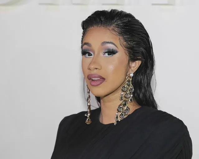 In this Wednesday, September 5, 2018 file photo, Cardi B attends the Tom Ford SS19 Show at the Park Avenue Armory during New York Fashion Week in New York. Nicki Minaj and Cardi B have been involved in an altercation that got physical at a New York Fashion Week party. Video circulating on social media shows Cardi B lunging toward someone and being held back at Harper's Bazaar Icons party Friday night, Sept. 7, 2018. (Photo by Brent N. Clarke/Invision/AP Photo)