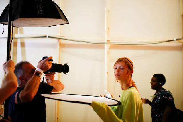 Models prepare backstage of the Preen by Thornton Bregazzi catwalk show at London Fashion Week Women's in London, Britain September 16, 2018. (Photo by Henry Nicholls/Reuters)