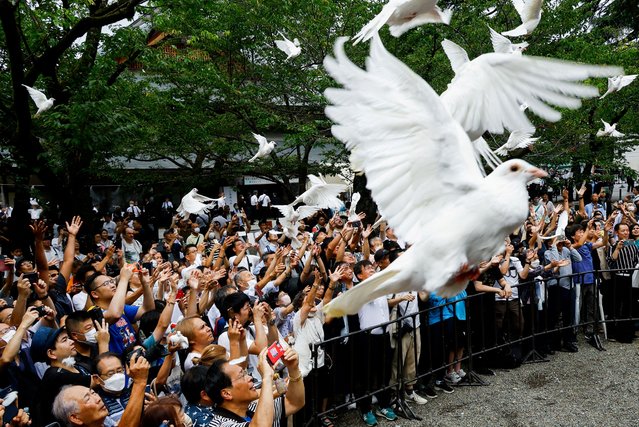 People release doves during their visit to the Yasukuni Shrine on the 78th anniversary of Japan's surrender in World War Two in Tokyo, Japan on August 15, 2023. (Photo by Kim Kyung-Hoon/Reuters)