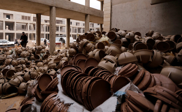 Empty shells, which Iraqi forces believe are used by Islamic State militants to create bombs, are pictured at the University of Mosul during a battle with Islamic State militants, in Mosul, Iraq, January 15, 2017. (Photo by Ahmed Saad/Reuters)