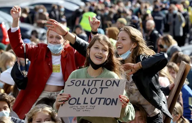 People participate in the Global Climate Strike of the movement Fridays for Future in Warsaw, Poland, September 24, 2021. (Photo by Kacper Pempel/Reuters)