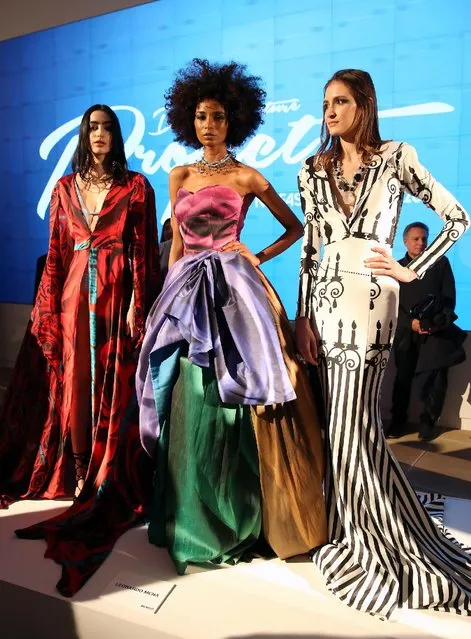 Models pose wearing designs by Leonardo Mena at the Epson Digital Couture Presentation February 2017 during New York Fashion Week at IAC Building on February 7, 2017 in New York City. (Photo by Monica Schipper/Getty Images)