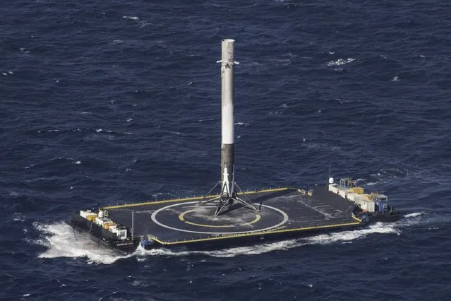 The reusable main-stage booster from the SpaceX Falcon 9 rocket makes a successful landing on a platform in the Atlantic Ocean about 185 miles (300 km) off the coast of Florida April 8, 2016 in this handout photo provided by SpaceX. (Photo by Reuters/SpaceX)