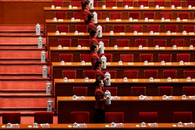 Attendants prepare tea before the opening session of the Chinese People's Political Consultative Conference (CPPCC) at the Great Hall of the People in Beijing, China, March 3, 2017. (Photo by Jason Lee/Reuters)