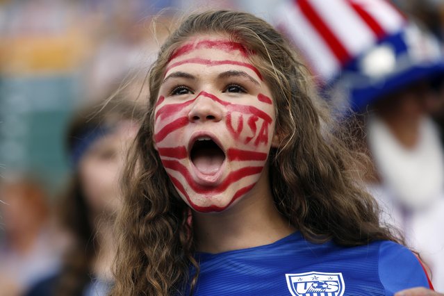 United States fan Bella Jandreski, 14, of San Diego, California, cheers before the game against the Colombia in the round of sixteen in Edmonton, June 22, 2015. (Photo by Michael Chow/USA TODAY Sports)