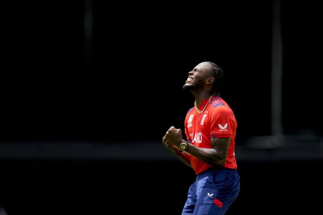 England's Jofra Archer reacts to missing a chance to run out Australia's Travis Head during an ICC Men's T20 World Cup cricket match at Kensington Oval in Bridgetown, Barbados, June 8, 2024. (Phoot by Ricardo Mazalan/AP Photo)