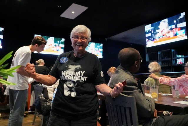 A supporter reacts during a 2024 U.S. presidential debate watch party hosted by the Fulton County Democratic Party, in Sandy Springs, Georgia on June 27, 2024. (Photo by Julio Cesar Chavez/Reuters)