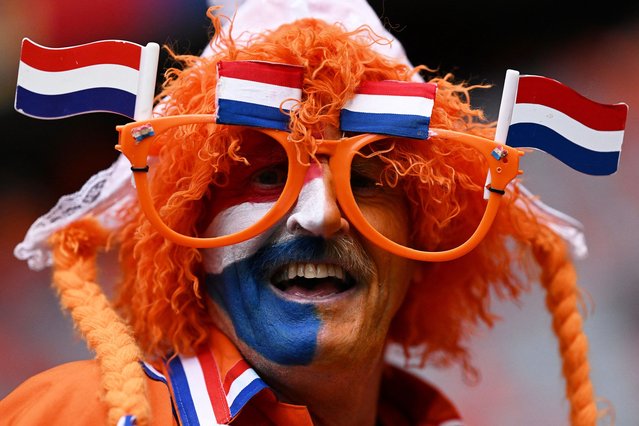 A Netherlands supporters poses prior to the UEFA Euro 2024 round of 16 football match between Romania and the Netherlands at the Munich Football Arena in Munich on July 2, 2024. (Photo by Kirill Kudryavtsev/AFP Photo)