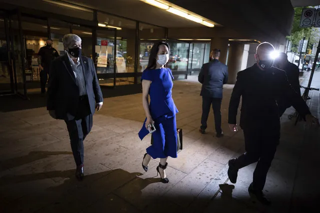 Meng Wanzhou, chief financial officer of Huawei, leaves the British Columbia Supreme Court during a break from her extradition hearing, in Vancouver, on Monday, August 16, 2021. (Photo by Darryl Dyck/The Canadian Press via AP Photo)
