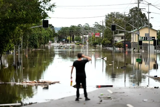 A main street is under floodwater on March 31, 2022 in Lismore, Australia. Evacuation orders have been issued for towns across the NSW Northern Rivers region, with flash flooding expected as heavy rainfall continues. It is the second major flood event for the region this month. (Photo by Dan Peled/Getty Images)