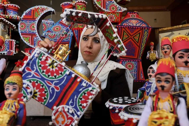 Palestinian Hanan al-Medhun (37) produces Ramadan drummer toys, colorful lanterns and crescent-shaped decorations at her workshop located in Al-Shati Refugee Camp, days before Ramadan in Gaza City, Gaza on March 15, 2022. (Photo by Ashraf Amra/Anadolu Agency via Getty Images)