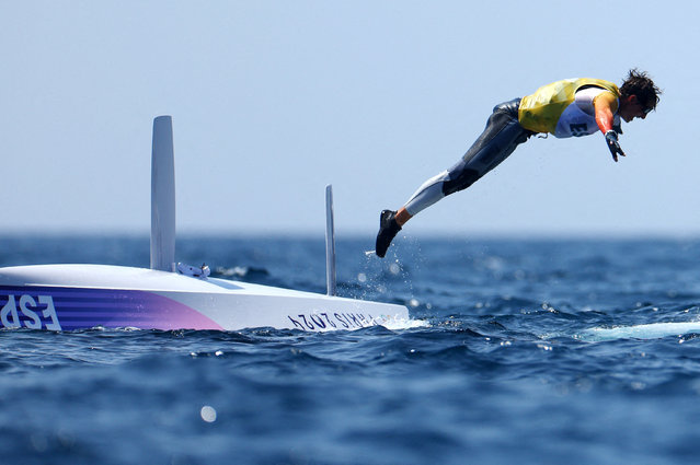 Florian Trittel Paul of Spain celebrates after winning gold in the men's skiff sailing race on August 2, 2024. (Photo by Lisi Niesner/Reuters)