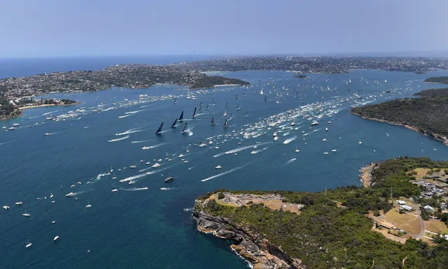 Info Track leads the fleet through Sydney Harbour following the start of the Sydney to Hobart Yacht Race in Sydney, Australia, 2​6 December 2019. (Photo by Dean Lewins/EPA/EFE)