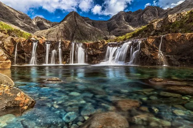 The Fairy Pools on Isle of Skye in Scotland is a series of atmospheric pools, waterfalls and cascades, small caves and caverns. (Photo by Sergio Del Rosso Photography/Getty Images)