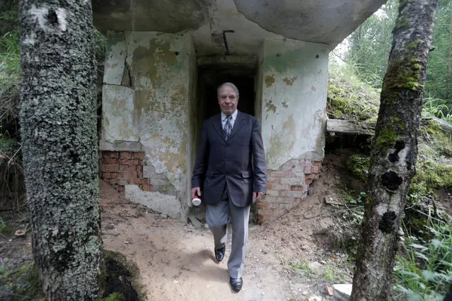 Former Soviet Army officer Leonid Konovalov leaves underground command post at the abandoned former Soviet R12 nuclear missile base in Zeltini, Latvia, July 22, 2016. (Photo by Ints Kalnins/Reuters)