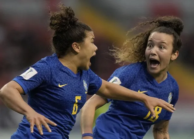 Brazil's Ana Clara, left, celebrates with teammate Rafa Levis, after scoring her side's first goal against The Netherlands during the Women's World Cup U-20 third-place soccer match at the National Stadium in San Jose, Costa Rica, Sunday, August 28, 2022. (Photo by Moises Castillo/AP Photo)