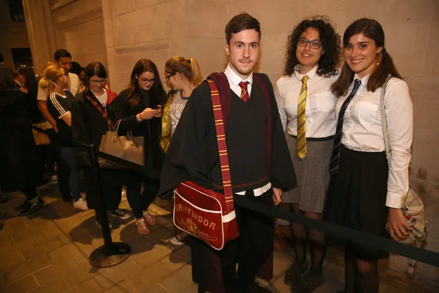 Fans in costume queue at an event to mark the release of the book of the play of Harry Potter and the Cursed Child parts One and Two at a bookstore in London, Britain July 30, 2016. (Photo by Neil Hall/Reuters)