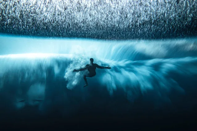 The Ocean Photographer of the Year 2022 – Winner – Ben Thouard. A surfer battles with the underwater turbulence created by the “heaviest wave in the world” – Teahupo’o – which translate as “place of skulls”, French Polynesia. (Photo by Ben Thouard/Ocean Photographer of the Year 2022)