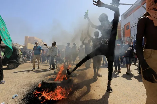 Protesters march during a rally against military rule following the last coup, in Khartoum, Sudan on October 25, 2022. (Photo by Mohamed Nureldin Abdallah/Reuters)