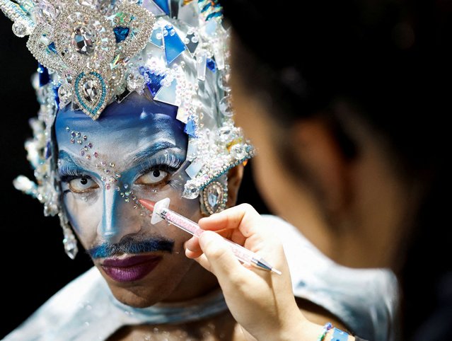 A participant prepares to perform in a drag queen competition during Carnival festivities in Las Palmas de Gran Canaria, Spain on February 16, 2024. (Photo by Borja Suarez/Reuters)