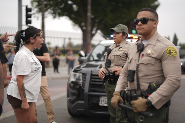 Protesters confront law enforcement agents outside an industrial park in Paramount section of Los Angeles on Saturday, June 7, 2025  (Photo by Eric Thayer/AP Photo)