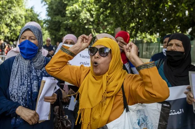 Tunisians stage a demonstration in front of Embassy of Spain demanding the release of Tunisian migrants who are held under bad living conditions at a migrant camp in Spain's Melilla city on September 04, 2020 in Tunis, Tunisia. (Photo by Nacer Talel/Anadolu Agency via Getty Images)