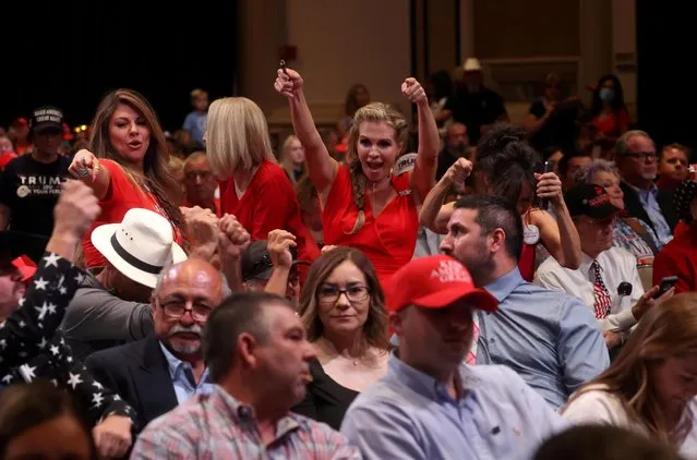Attendees dance to the music as they wait for U.S. President Donald Trump to take the stage during a campaign event at the Arizona Grand Resort and Spa in Phoenix, Arizona U.S., September 14, 2020. (Photo by Jonathan Ernst/Reuters)