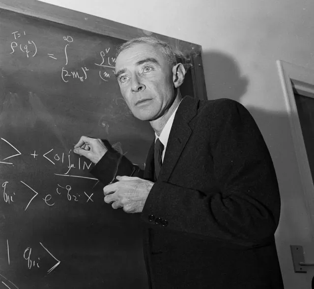 Dr. J. Robert Oppenheimer, creator of the atom bomb, is shown at his study in Princeton University's Institute for Advanced Study, Princeton, N.J., December 15, 1957. Oppenheimer has been leading an ivory tower career since the government banned him from classified science projects on security grounds. (Photo by John Rooney/AP Photo)