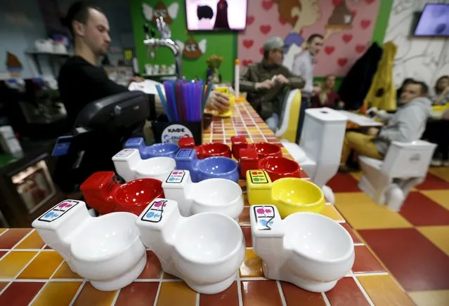 Cups designed in the likeness of urinals are seen on a counter at Crazy Toilet Cafe in central Moscow, Russia October 30, 2015. (Photo by Sergei Karpukhin/Reuters)