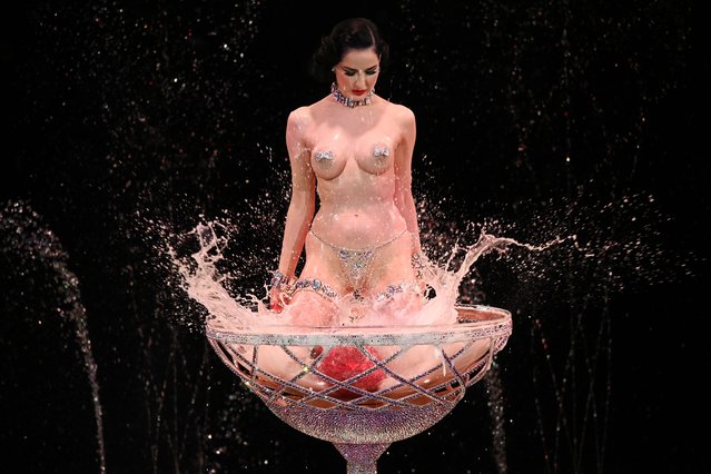 American vedette, burlesque dancer, model, and businesswoman Dita Von Teese  performs on the runway during the Alexis Mabille Haute Couture Fall/Winter 2024-2025 show as part of Paris Fashion Week on June 25, 2024 in Paris, France. (Photo by David Fisher/Rex Features/Shutterstock)
