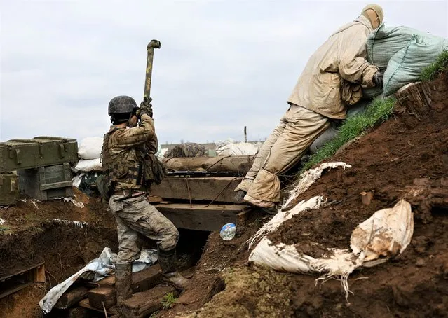 Ukrainian service man Oleksandr with 24th brigade stands on his position in the trenches at the frontline, amid Russia?s attack on Ukraine, near Niu York, Donetsk region, Ukraine on April 4, 2023. (Photo by Kai Pfaffenbach/Reuters)