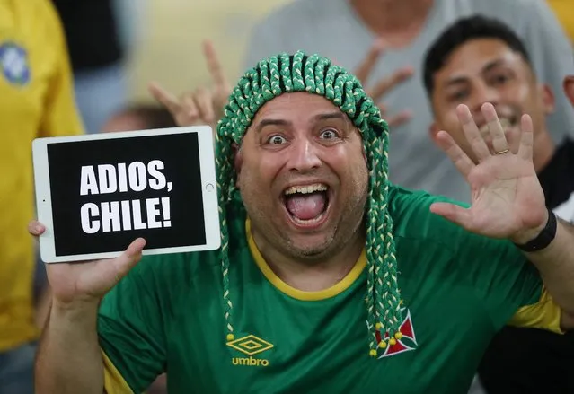 Fans are seen in the stands before the South American Qualifiers, Brazil v Chile match at Estadio Maracana, Rio de Janeiro, Brazil on March 24, 2022. (Photo by Ricardo Moraes/Reuters)