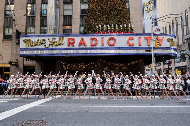 A view of the Rockettes posing in front of Radio City Music Hall during the Macy's Thanksgiving Day Parade on November 27, 2025 in New York City. (Photo by Craig T Fruchtman/Getty Images)