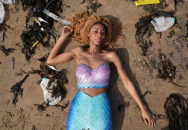 Chisanga Mwila dressed as Ariel from The Little Mermaid on Cullercoats beach, Newcastle on Tuesday, May 9, 2023 ahead of the 2023 live-action remake of the film as part of an awareness campaign from sustainable toilet paper company Oceans highlighting the negative impact of marine pollution on the British coastline. (Photo by Owen Humphreys/PA Wire)