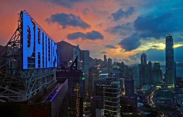 A general view of Hong Kong's business district is seen Thursday, August 1, 2013. The Hong Kong Observatory has issued a strong wind signal number three as Tropical Storm Jebi edges closer to Hong Kong. (Photo by Vincent Yu/AP Photo)