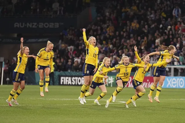 Sweden celebrate after defeating the United States in a penalty shootout in their Women's World Cup round of 16 soccer match in Melbourne, Australia, Sunday, August 6, 2023. (Photo by Scott Barbour/AP Photo)