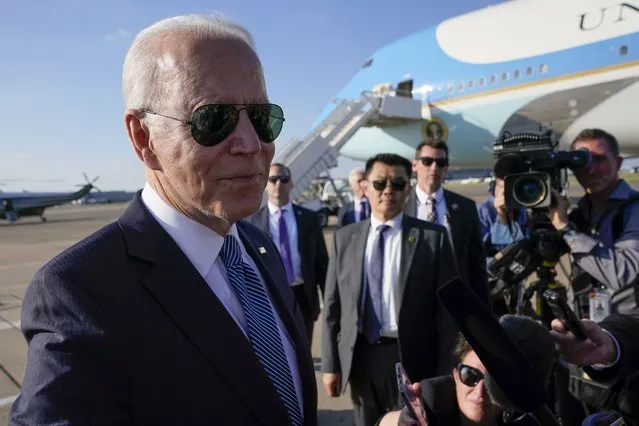 President Joe Biden speaks with reporters before boarding Air Force One at Heathrow Airport in London, Sunday, June 13, 2021. Biden is en route to Brussels to attend the NATO summit. (Photo by Patrick Semansky/AP Photo)
