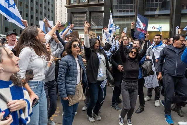 People protest in support of Israel near the Israeli consulate on October 8, 2023 in New York City. On October 7, the Palestinian militant group Hamas launched a surprise attack on Israel from Gaza by land, sea, and air, killing over 700 people and wounding more than 2000. According to reports, 130 Israeli soldiers and civilians have also been kidnapped by Hamas and taken into Gaza. The attack prompted a declaration of war by Israeli Prime Minister Benjamin Netanyahu, and ongoing retaliatory strikes by Israel on Gaza killing hundreds. (Photo by Ron Adar/Rex Features/Shutterstock)