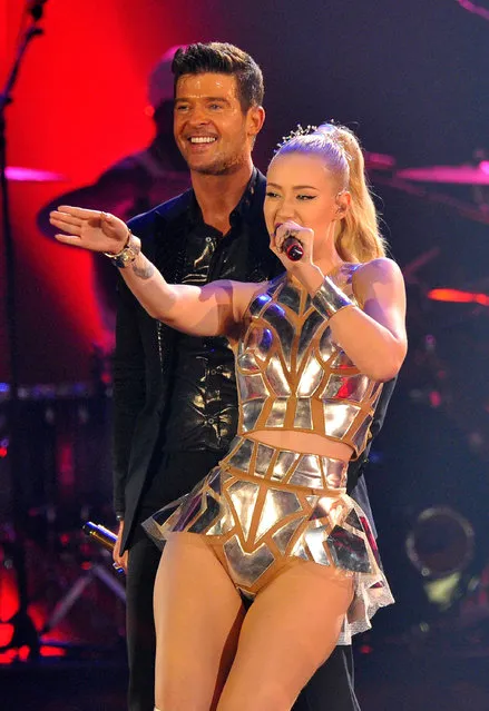 Robin Thicke and Iggy Azalea perform onstage during the MTV EMA's 2013 at the Ziggo Dome on November 10, 2013 in Amsterdam, Netherlands. (Photo by Gareth Cattermole/Getty Images for MTV)