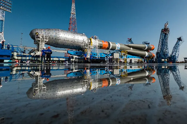 This handout photograph released by the Russian Space Agency Roscosmos on June 28, 2021, shows a Soyuz-2.1b rocket booster with British OneWeb satellites is seen at a launchpad at the Vostochny cosmodrome outside the city of Uglegorsk, about 200 kms from the city of Blagoveshchensk in the far eastern Amur region. (Photo by Russian Space Agency Roscosmos/AFP Photo)