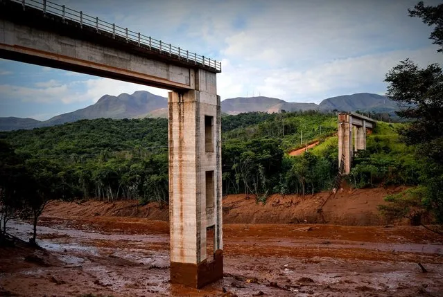 A general view of damage caused by the breakage of a dam containing mineral waste from Vale, the world's largest iron producer, in Brumadinho, municipality of Minas Gerais, Brazil, 25 January 2019. The rupture of the dam of the mining company Vale left at least 7 fatalities and around 150 missing, just three years after a similar tragedy caused the greatest environmental catastrophe in the country. (Photo by Yuri Edmundo/EPA/EFE)