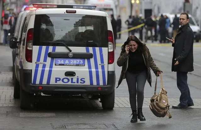 A woman reacts following a suicide bombing in a major shopping and tourist district in central Istanbul March 19, 2016. (Photo by Kemal Aslan/Reuters)