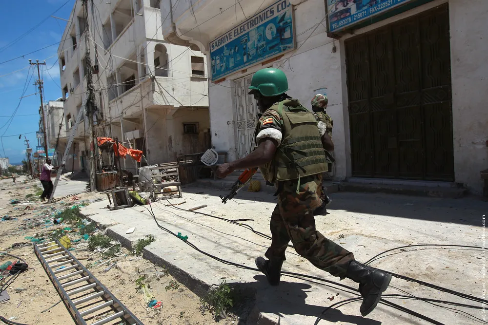 African Union Peacekeepers Patrol Mogadishu After Al-Shabab Militants Withdraw