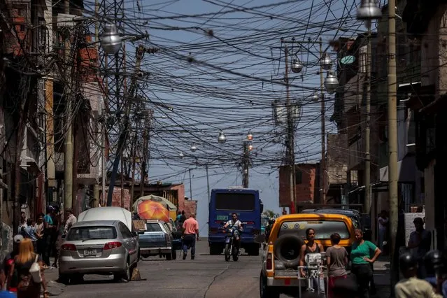 A view of electricity wires, in Caracas, Venezuela, 03 April 2019. West Venezuela started receiving electricity intermittently in the states of Zulia, Falcon, Merida and Trujillo after 100 hours without power. (Photo by Miguel Gutierrez/EPA/EFE/Rex Features/Shutterstock)