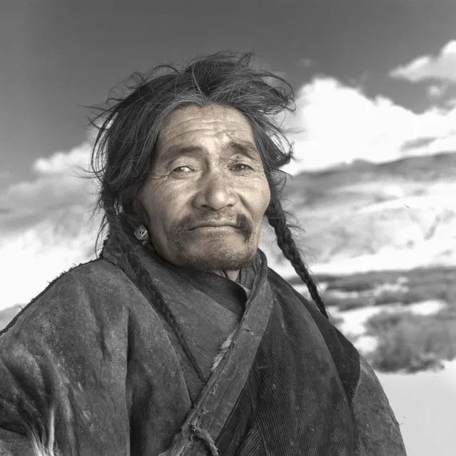“Norzum vividly remembers fleeing Tibet with his family as a boy. Walking at night and hiding during the day, it took over 20 days to cross the border into Ladakh. During the bitter cold journey, at altitudes above 16,000 feet, his younger brother died. He says that the area in which he is now forced to live is much harsher than his boyhood home”. (Phil Borges)