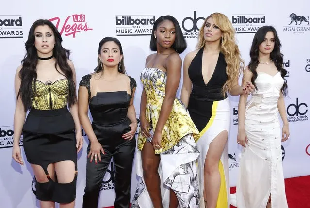 Lauren Jauregui, from left, Ally Brooke, Normani Hamilton, Dinah-Jane Hansen, and Camila Cabello of the musical group Fifth Harmony arrive at the Billboard Music Awards at the MGM Grand Garden Arena on Sunday, May 17, 2015, in Las Vegas. (Photo by Eric Jamison/Invision/AP Photo)