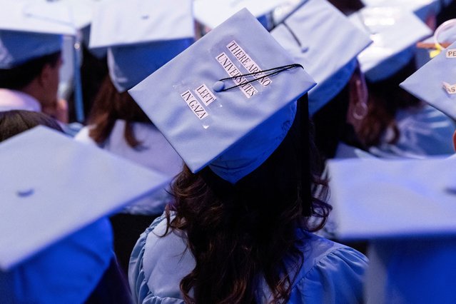 A student wears a statement on their cap in support of Palestinians during a graduation ceremony at Columbia University Journalism School, during the ongoing conflict between Israel and the Palestinian Islamist group Hamas, in New York City on May 15, 2024. (Photo by Caitlin Ochs/Reuters)