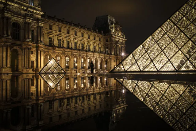 “The Louvre in the night”. Mesmerizing moment to witness the beautiful pyramid along with its reflection. Picture taken at the Louvre museum, Paris. The couple at the center added romantic mood to the picture. Photo location: Paris. (Photo and caption by Arun Nagargoje/National Geographic Photo Contest)