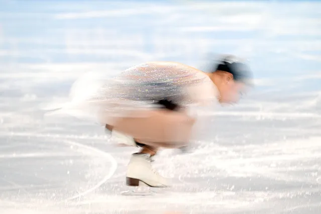 Japan's Mana Kawabe competes in the women's single skating short program of the figure skating event during the Beijing 2022 Winter Olympic Games at the Capital Indoor Stadium in Beijing on February 15, 2022. (Photo by Kirill Kudryavtsev/AFP Photo)
