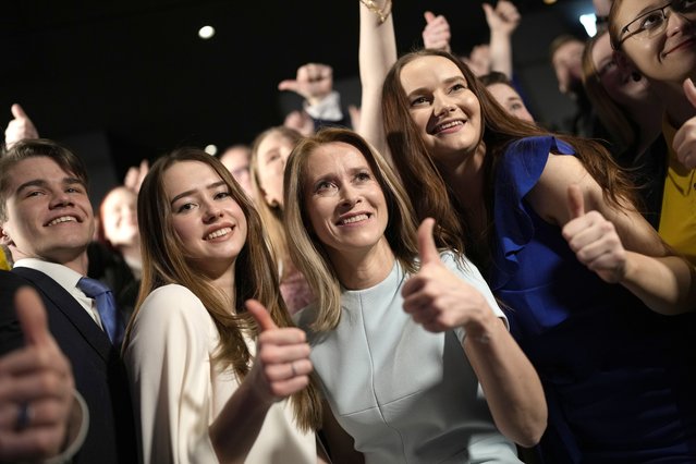 Members of the Reform Party and supporters of Prime Minister Kaja Kallas, centre, pose for photo in Tallinn, Estonia, Sunday, March 5, 2023. Voters in Estonia cast ballots Sunday in a parliamentary election that the center-right Reform Party of Prime Minister Kallas, one of Europe's most outspoken supporters of Ukraine, was considered a favorite to win. (Photo by Sergei Grits/AP Photo)